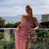 Vestito lungo attillato da donna con paillettes, scollo a barca, senza schienale e spacco con fiocco