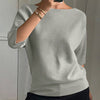 T-shirt in maglia da donna elegante e alla moda con maniche a tre quarti e scollo a barca
