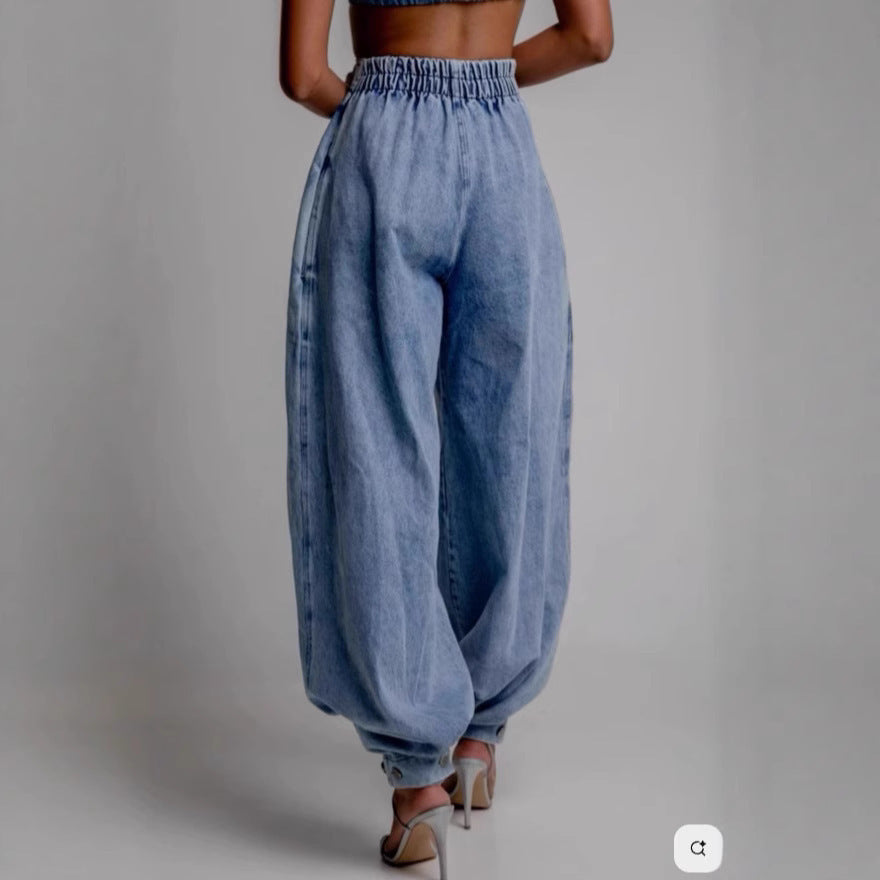 Jeans larghi con cerniera a vita alta e allacciatura alla caviglia