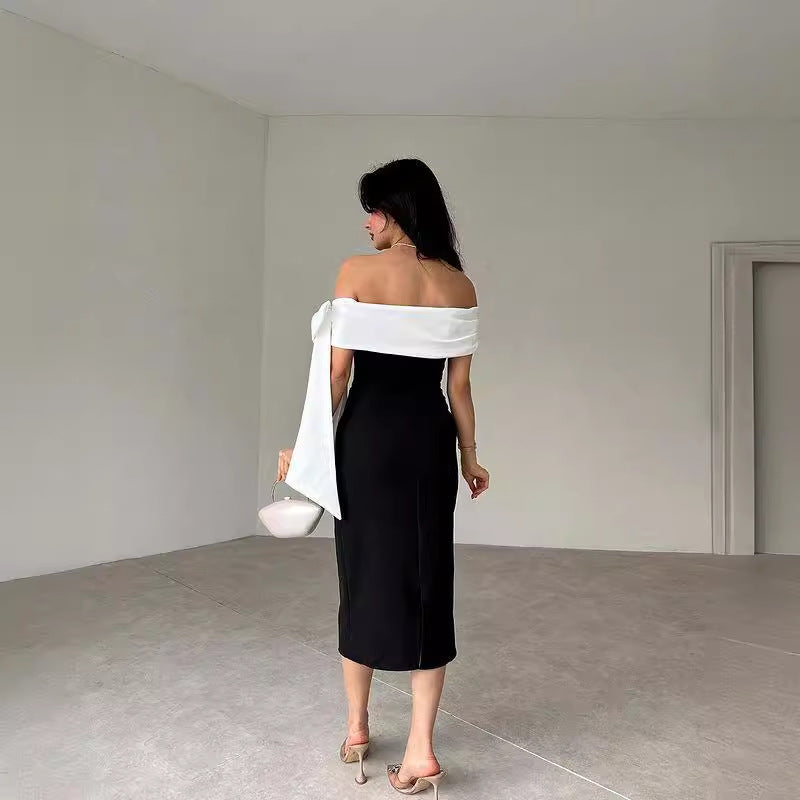 Vestito da cocktail elegante da donna, scollato, con fiocco e abbinamento colori bianco e nero