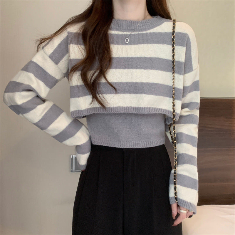 Maglione a righe alla moda a maniche lunghe