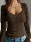 Top in pizzo romantico a maniche lunghe con fiocco