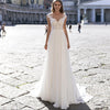 Un abito da sposa in chiffon della serie A con scollo a V e maniche lunghe