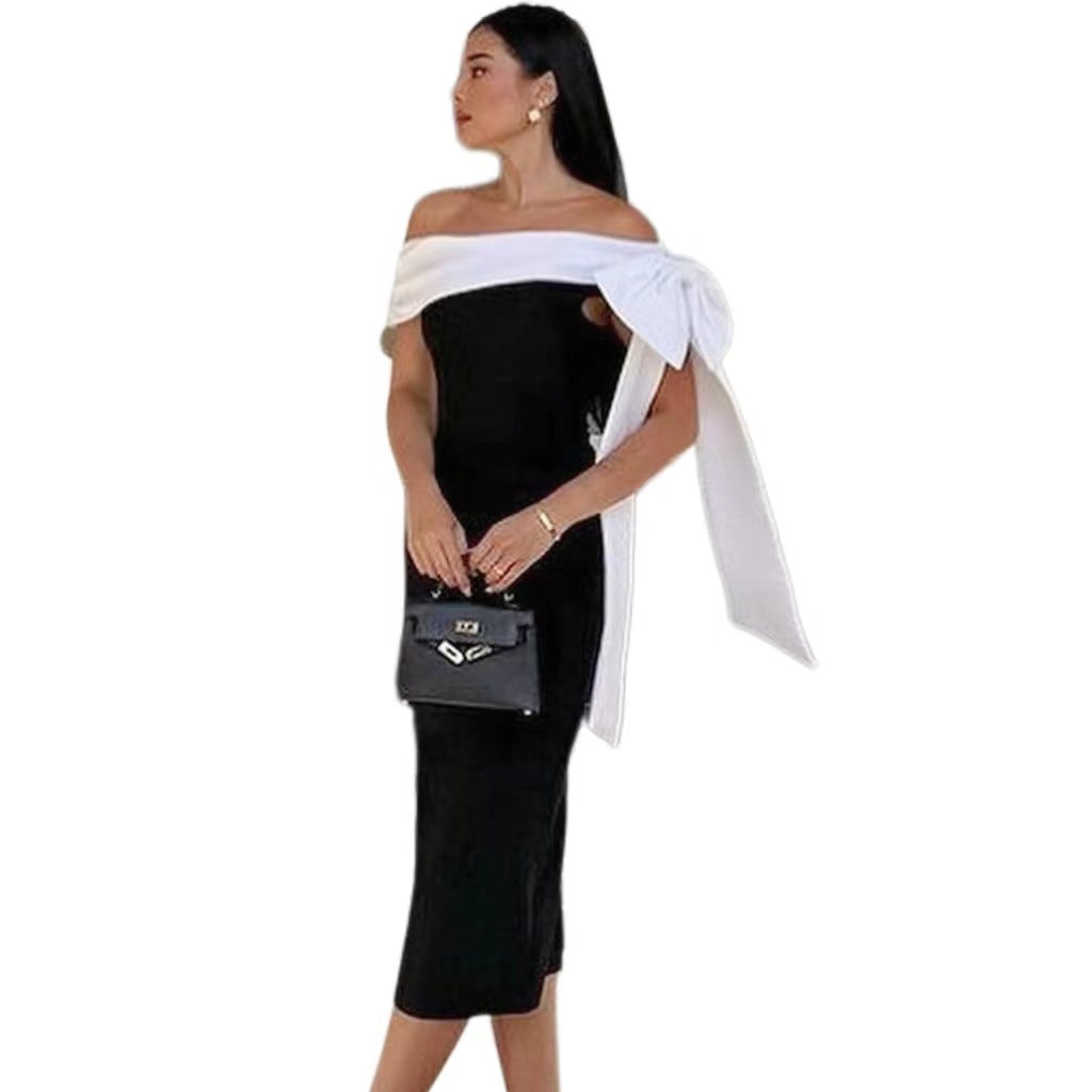 Vestito da cocktail elegante da donna, scollato, con fiocco e abbinamento colori bianco e nero