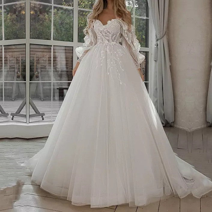 Abito da sposa Boho Abito da sposa con maniche a sbuffo e spalle scoperte