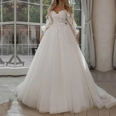 Abito da sposa Boho Abito da sposa con maniche a sbuffo e spalle scoperte