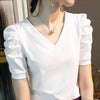 Top da donna vintage con maniche a sbuffo a pieghe