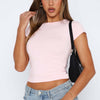 Top aderente versatile con orlo irregolare da donna