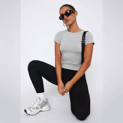 Top aderente versatile con orlo irregolare da donna