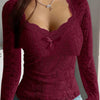 Top in pizzo romantico a maniche lunghe con fiocco