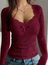 Top in pizzo romantico a maniche lunghe con fiocco