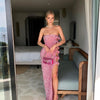 Vestito lungo attillato da donna con paillettes, scollo a barca, senza schienale e spacco con fiocco