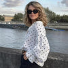 Camicia casual a pois ampia con bottoni frontali per un look elegante da inizio autunno