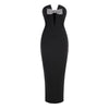 Vestito da festa aderente con spalle scoperte, schiena nuda e scollo a V profondissimo tipo bandeau