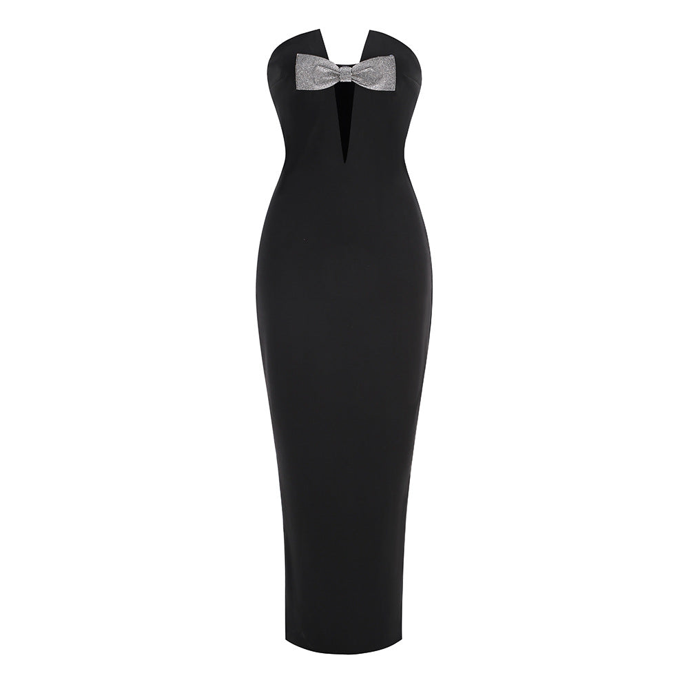 Vestito da festa aderente con spalle scoperte, schiena nuda e scollo a V profondissimo tipo bandeau