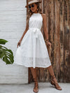 Elegant White Embroidered High-waisted Halter Dress With A Cinched Waist