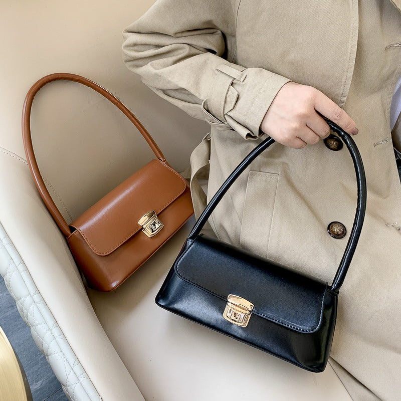 Piccola borsa a mano da donna retrò, nuova personalità