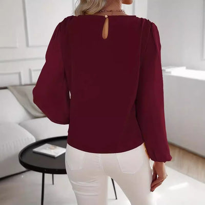 Maglia a maniche lunghe con scollo rotondo in tinta unita