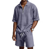 Completo da uomo con pantaloncini e cerniera a maniche corte