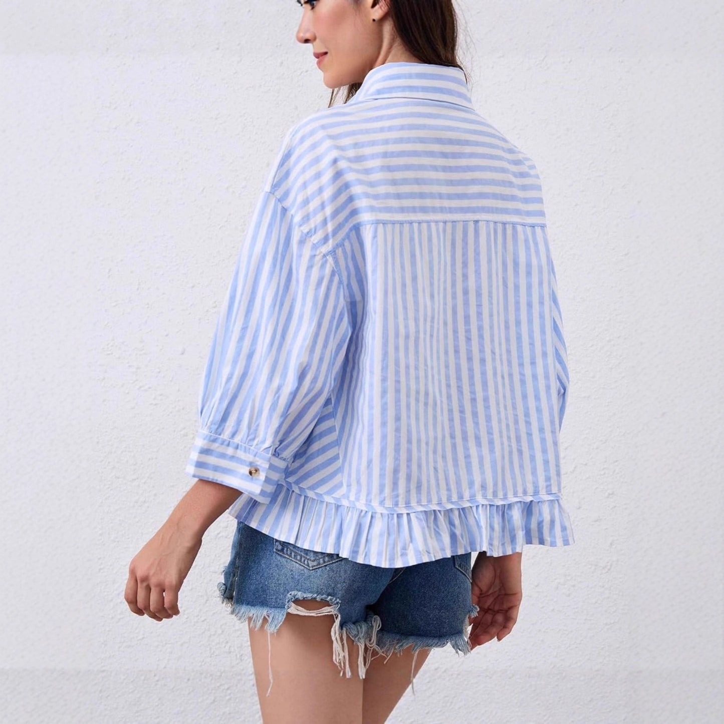 Maglia casual dal taglio morbido con abbottonatura frontale e maniche a tre quarti