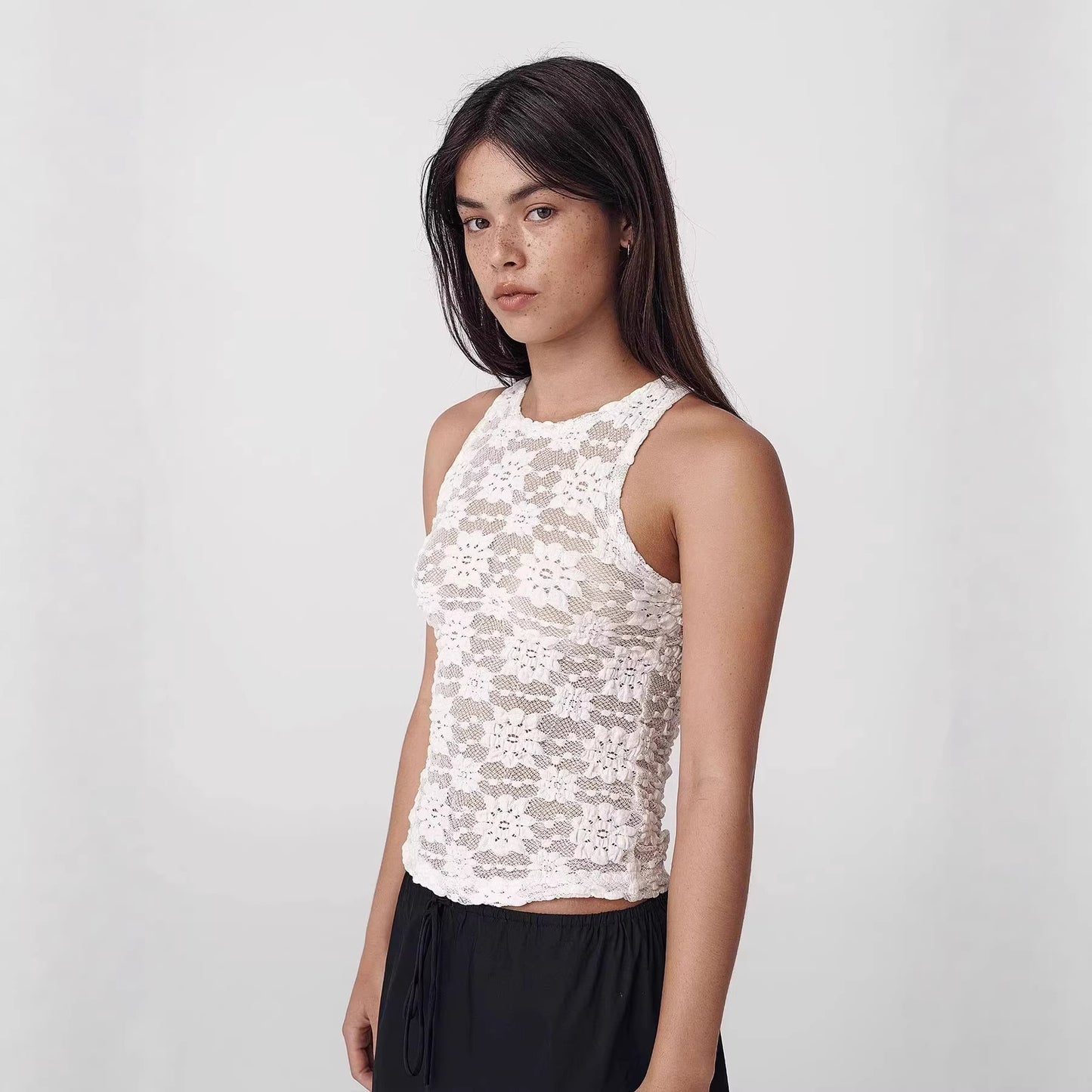 Top da donna attillato, sexy, traforato e alla moda