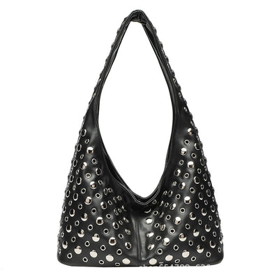 Borsa da donna alla moda con rivetti a pois