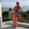 Vestito lungo attillato da donna con paillettes, scollo a barca, senza schienale e spacco con fiocco