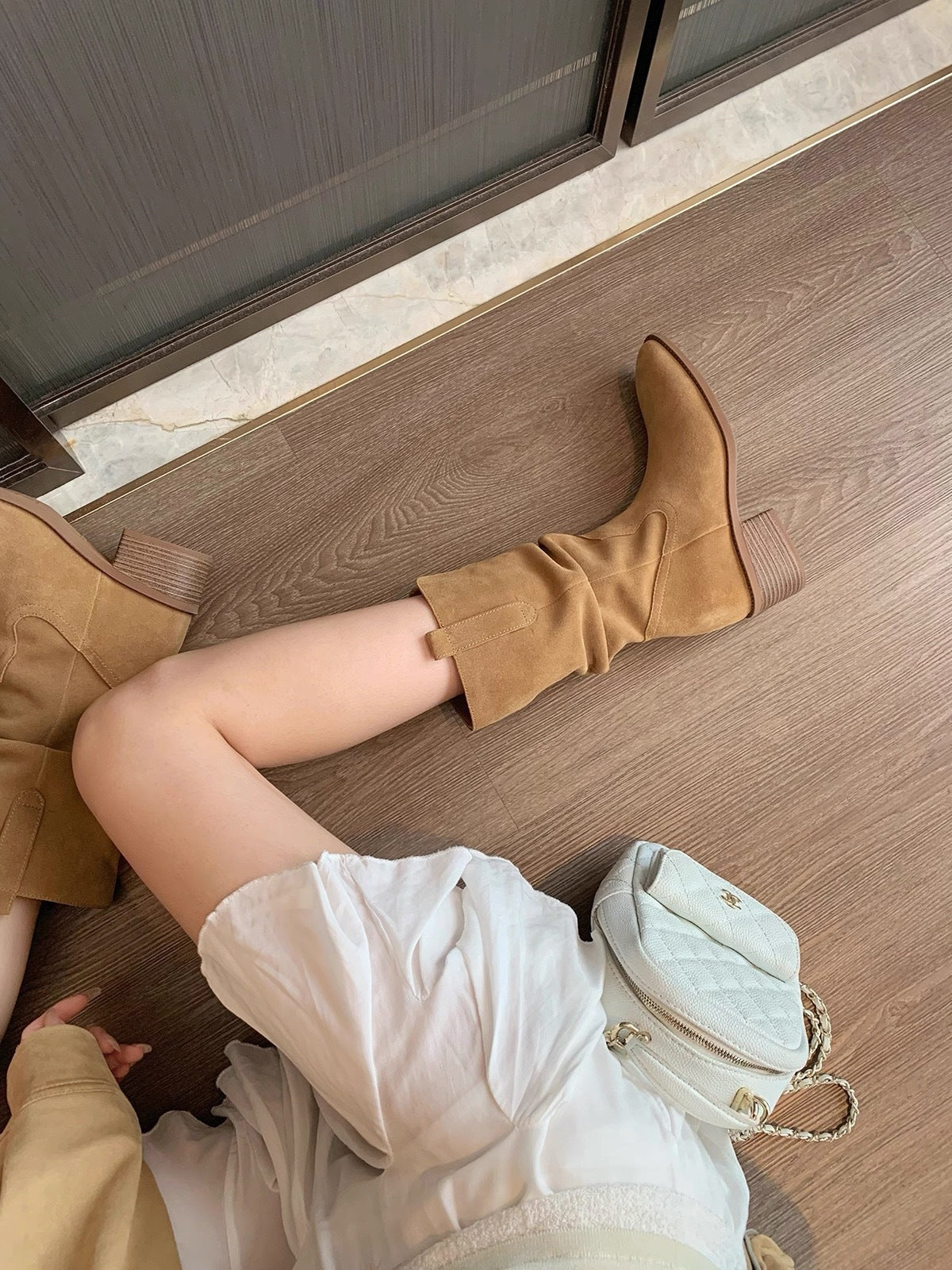 Stivali Martin in pelle con tacco alto e rialzo piccolo