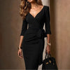 V-neck Dress With A Mid-length Sleeve Hugging The Hips In Black