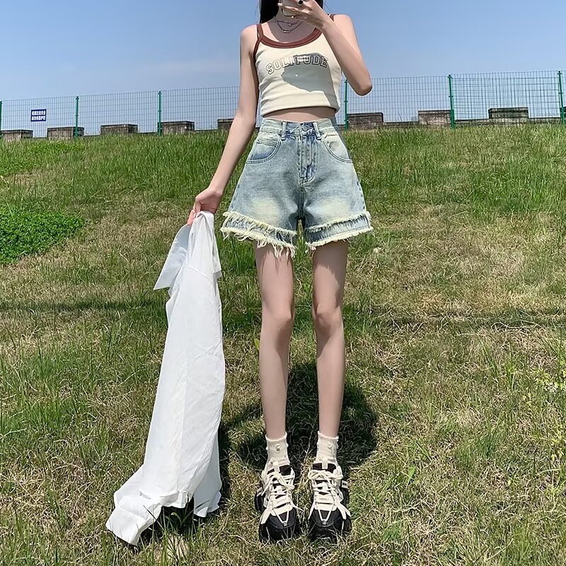 Shorts di jeans sfrangiati da donna, nuovo stile estivo a vita alta