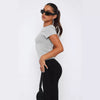Top aderente versatile con orlo irregolare da donna