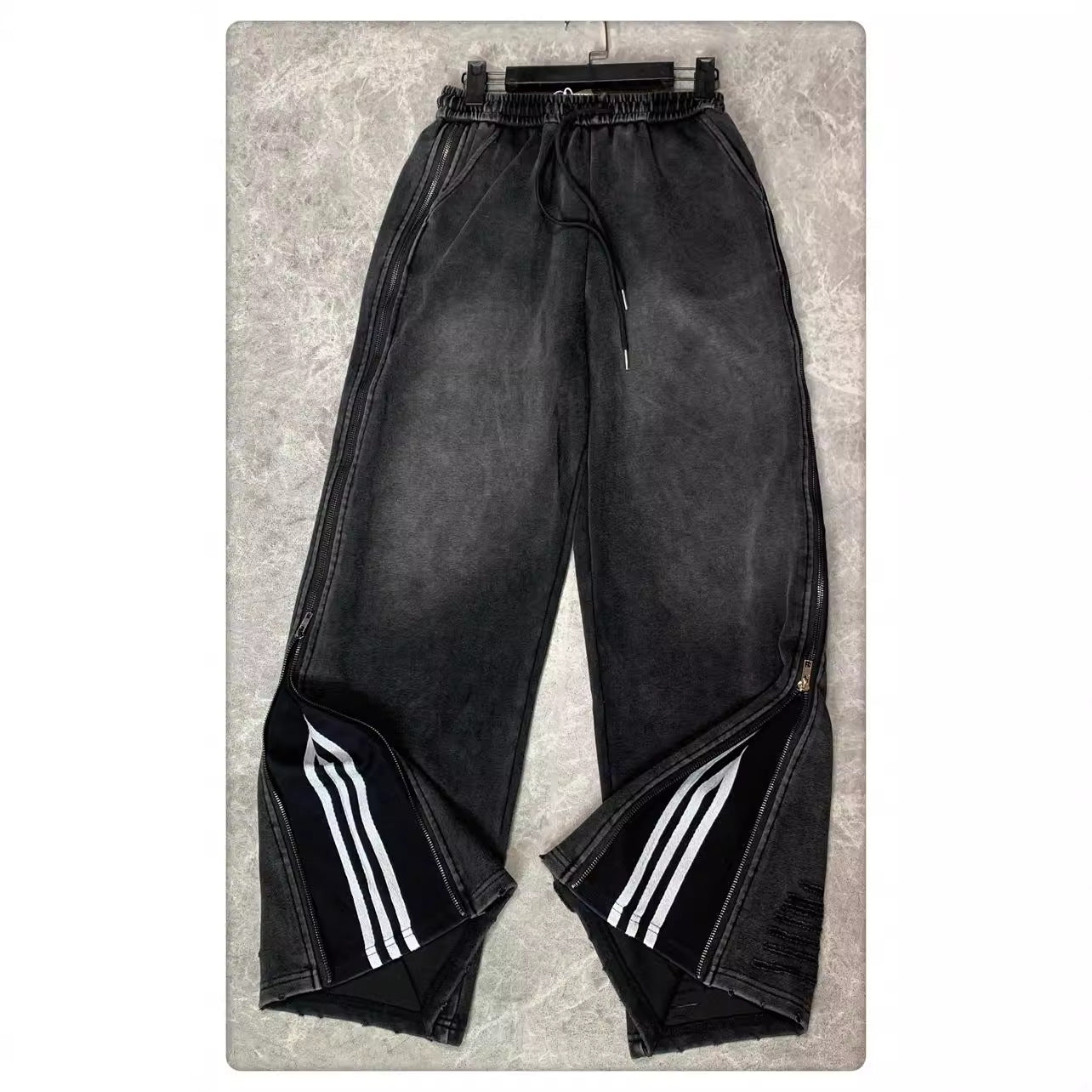 Pantaloni larghi a gamba larga con cerniera laterale bidirezionale e tre barre Design Sense