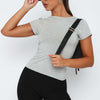 Top aderente versatile con orlo irregolare da donna