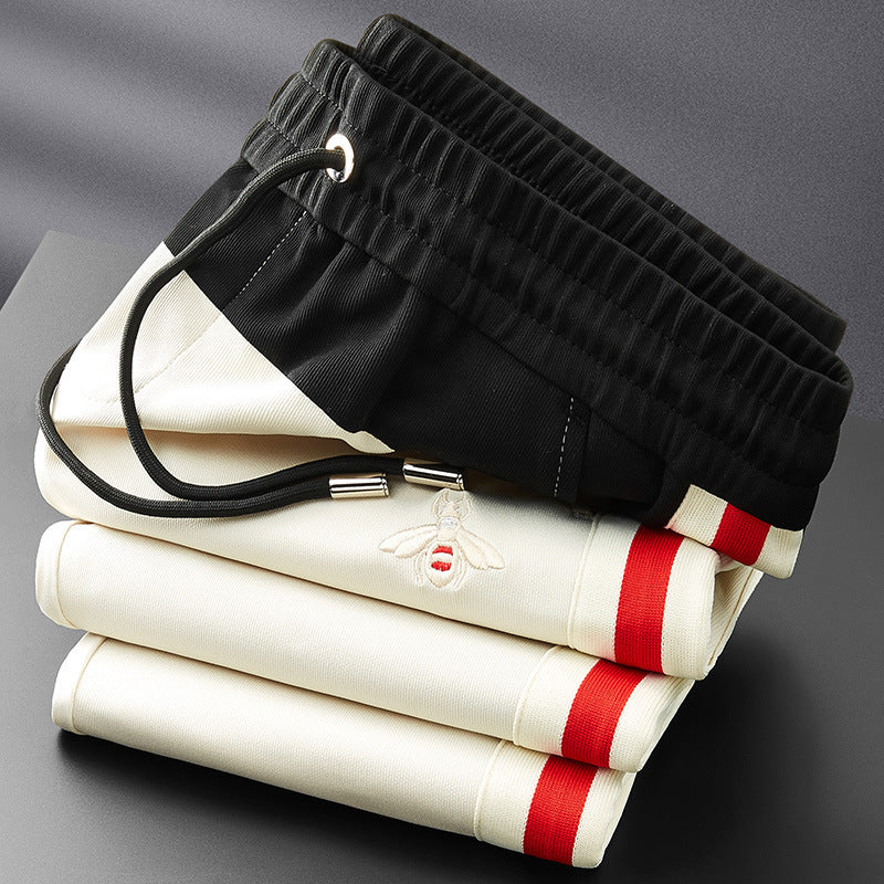 Pantaloni da tuta sottili con patchwork a contrasto di colore per uomo