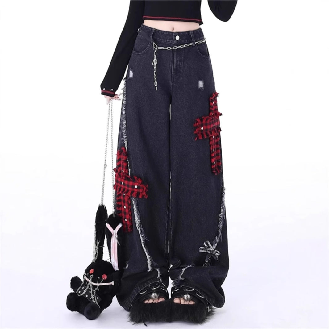 Jeans a quadri rossi retrò con cuciture strappate