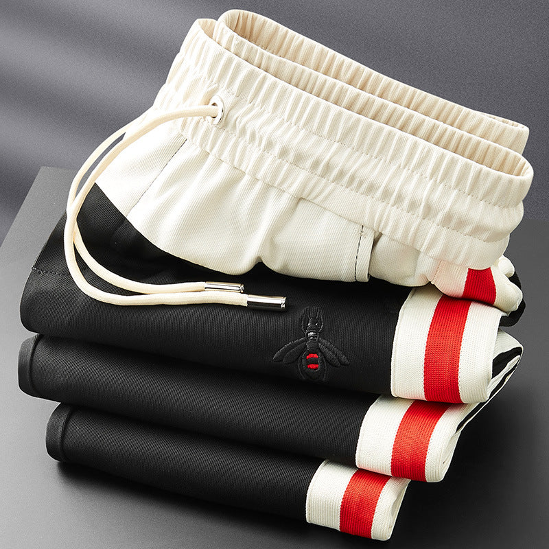 Pantaloni da tuta sottili con patchwork a contrasto di colore per uomo