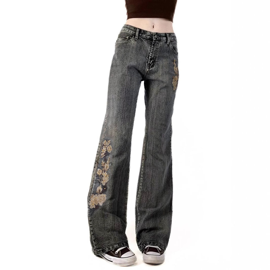 Pantaloni casual in denim con ricamo floreale