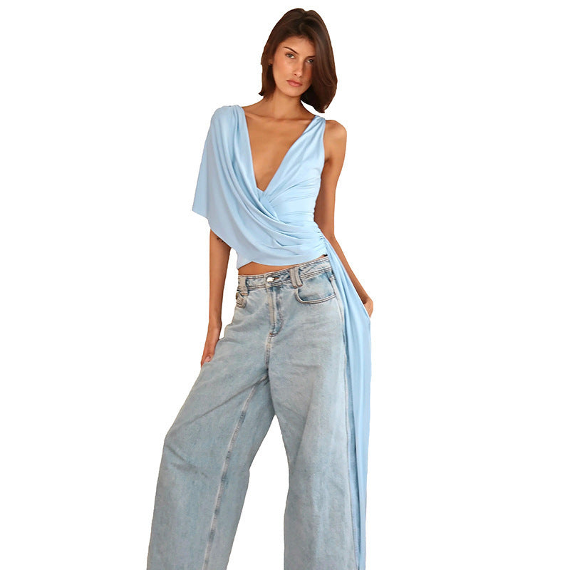 Top da donna alla moda con scollo a V profondo, vestibilità ampia e irregolare, con laccetti in vita