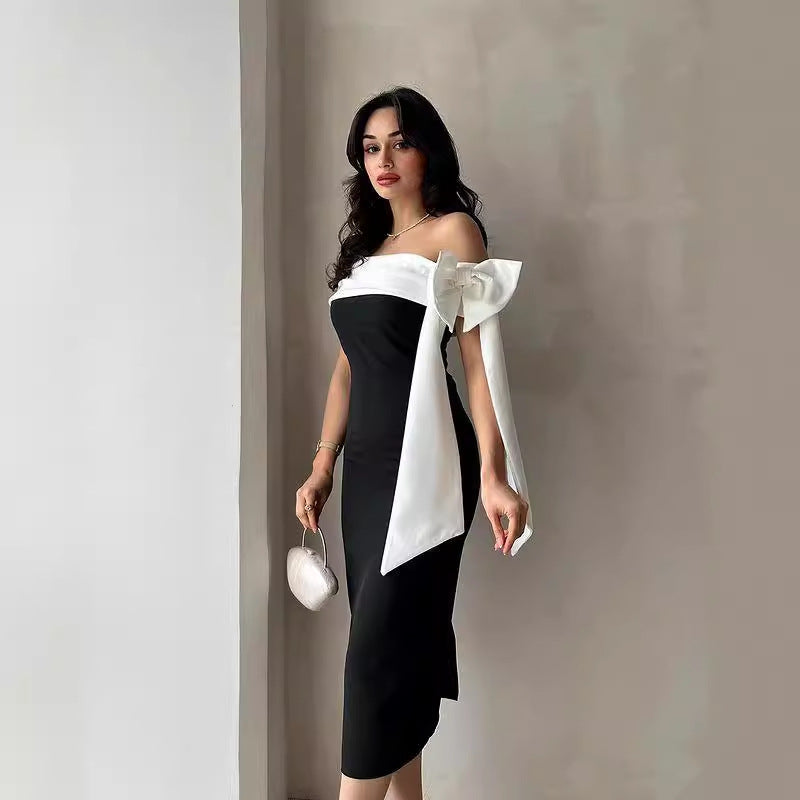 Vestito da cocktail elegante da donna, scollato, con fiocco e abbinamento colori bianco e nero