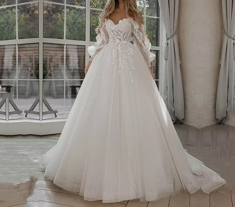 Abito da sposa Boho Abito da sposa con maniche a sbuffo e spalle scoperte