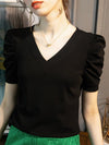 Top da donna vintage con maniche a sbuffo a pieghe