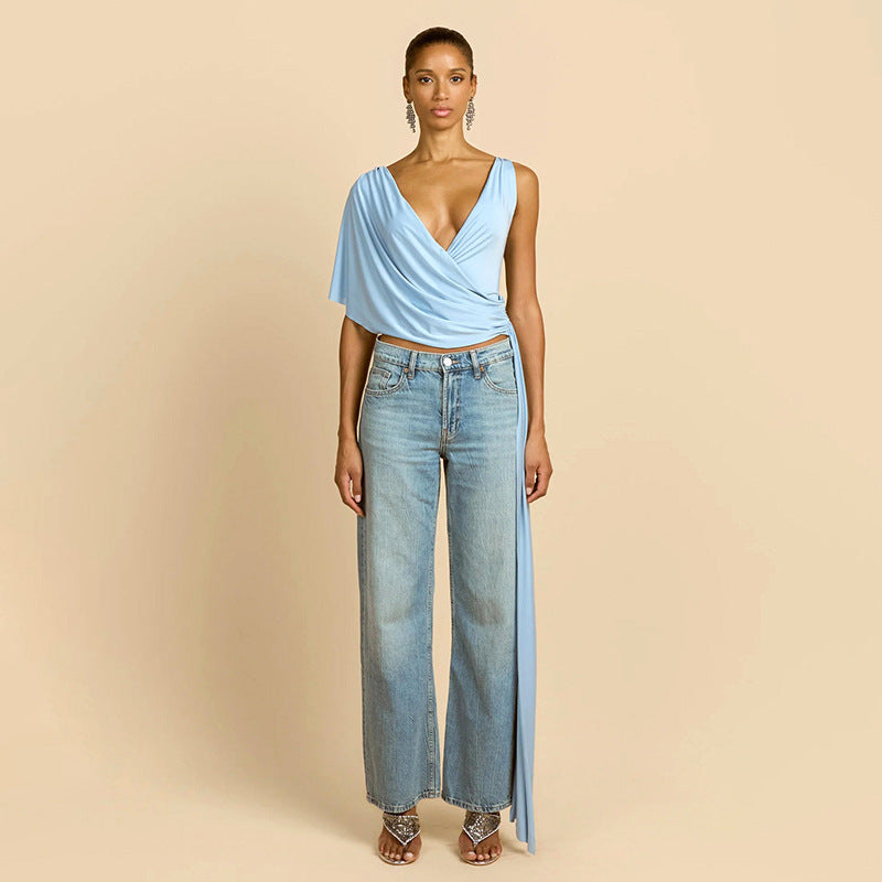 Top da donna alla moda con scollo a V profondo, vestibilità ampia e irregolare, con laccetti in vita