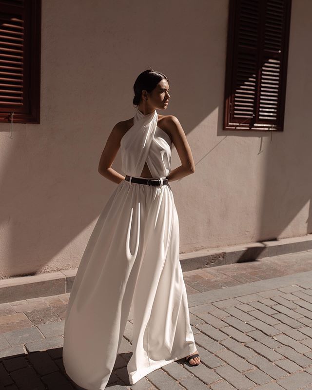Tuta intera sexy da donna senza maniche con scollo all'americana e schiena scoperta in poliestere