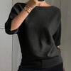T-shirt in maglia da donna elegante e alla moda con maniche a tre quarti e scollo a barca