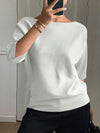 T-shirt in maglia da donna elegante e alla moda con maniche a tre quarti e scollo a barca