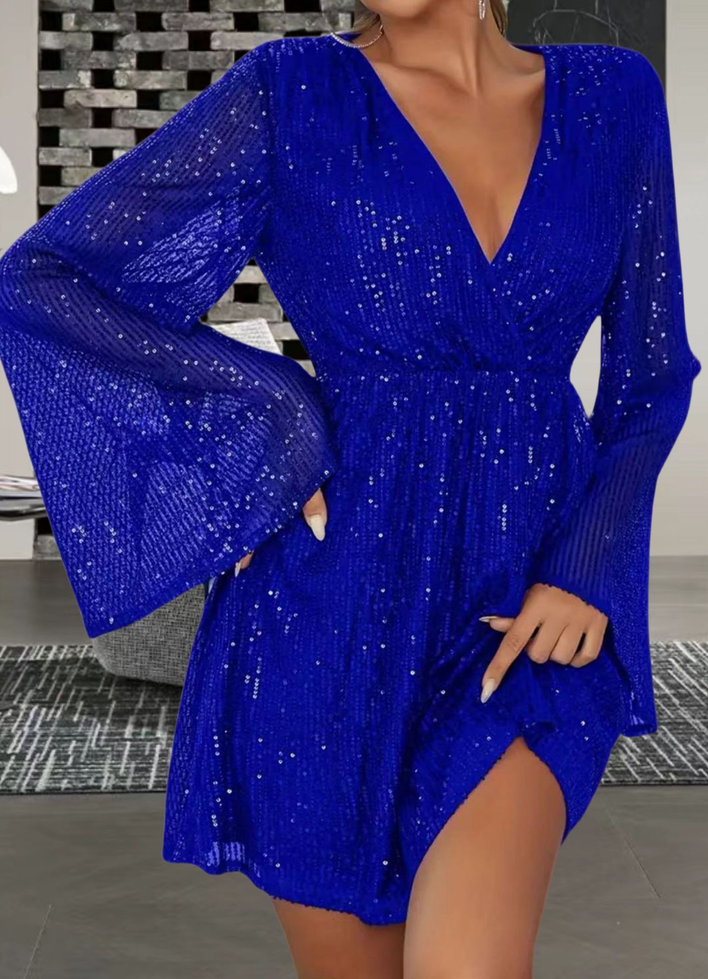 Abito da sera elegante con scollo a V, paillettes in vita e effetto snellente