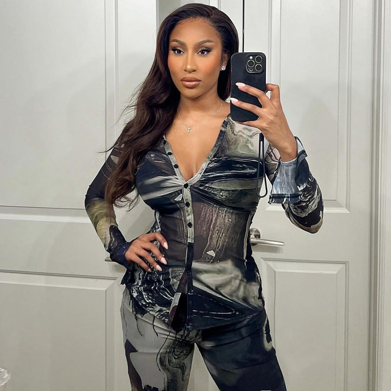 Completo due pezzi con bottoni e pieghe sul risvolto, stampa casual