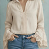 Elegante blusa di cotone con finiture in pizzo e modello pullover