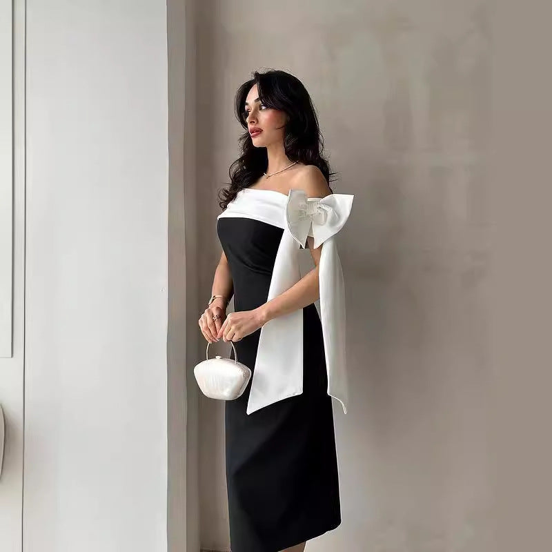 Vestito da cocktail elegante da donna, scollato, con fiocco e abbinamento colori bianco e nero