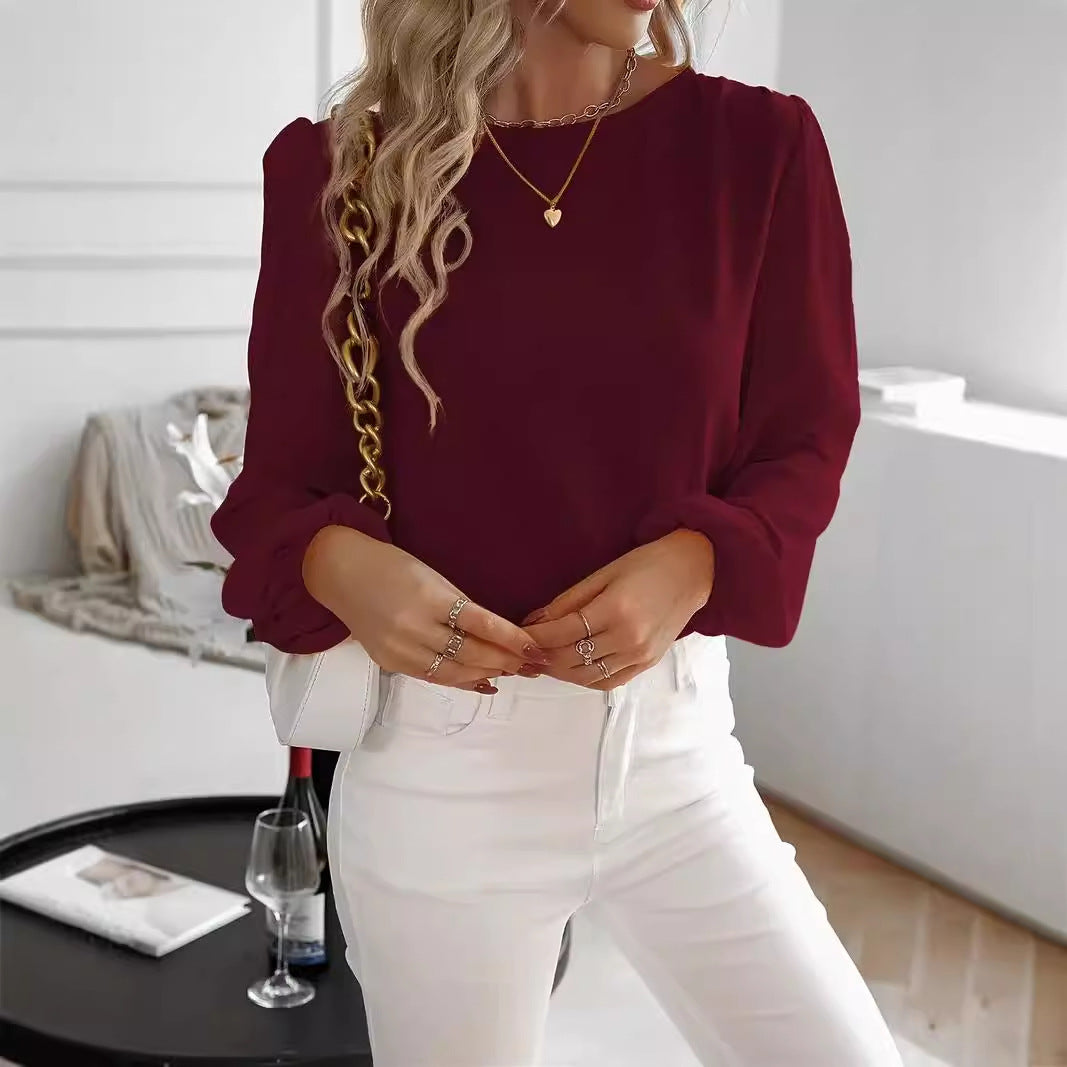 Maglia a maniche lunghe con scollo rotondo in tinta unita